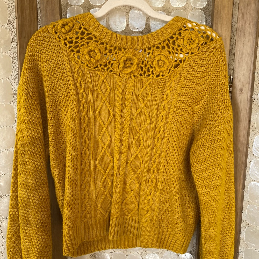 knit yellow sweater